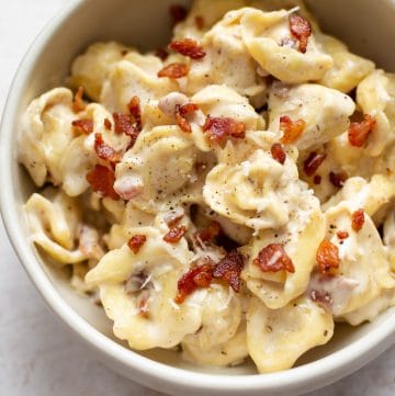 close-up of bacon tortellini Alfredo