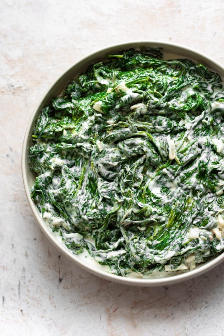 bowl of the BEST creamed spinach