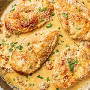 a skillet with creamy cajun chicken