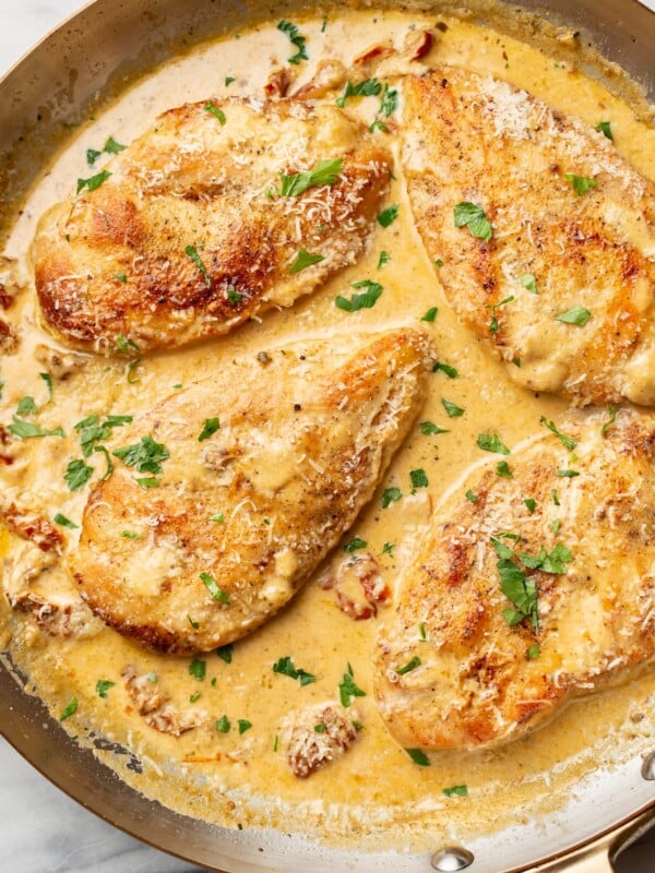 a skillet with creamy cajun chicken