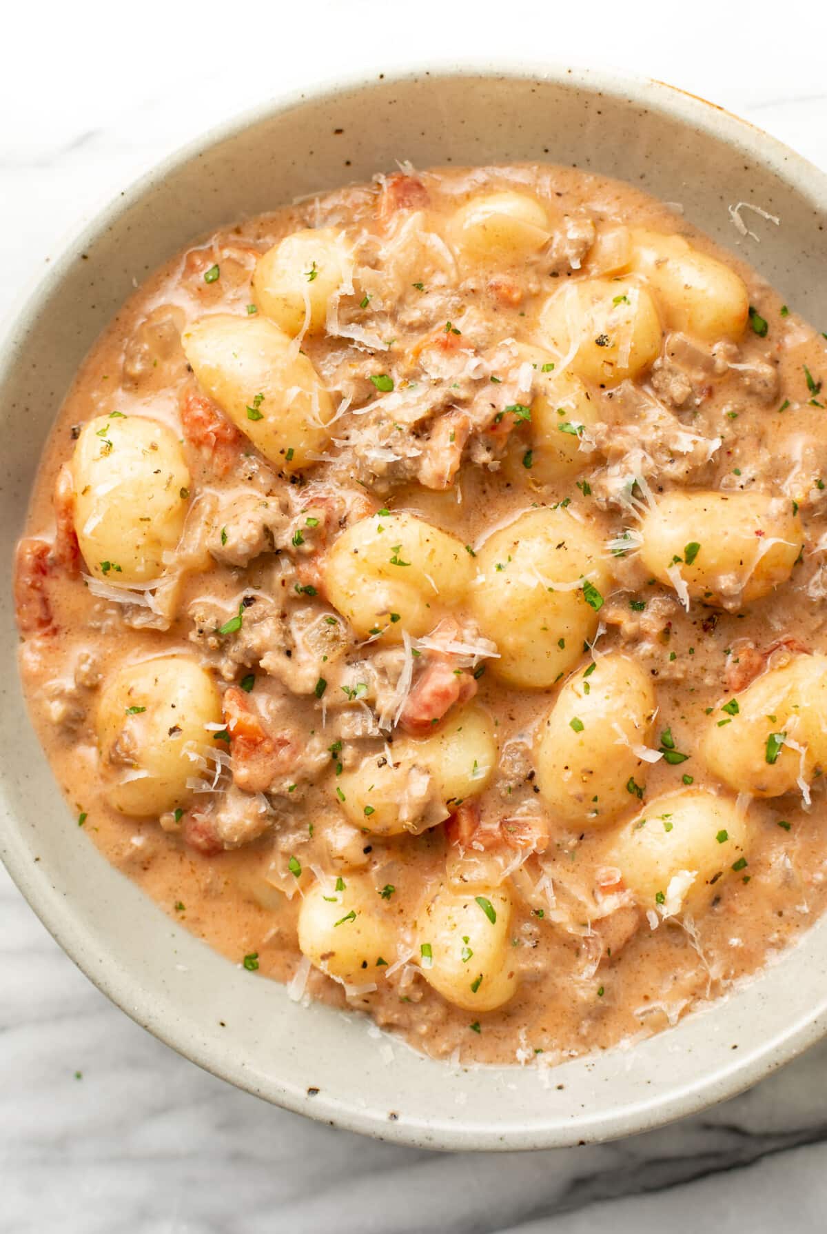 a bowl with ground beef gnocchi