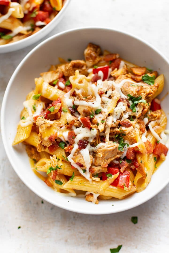 BBQ chicken pasta sauce over penne (in bowls)