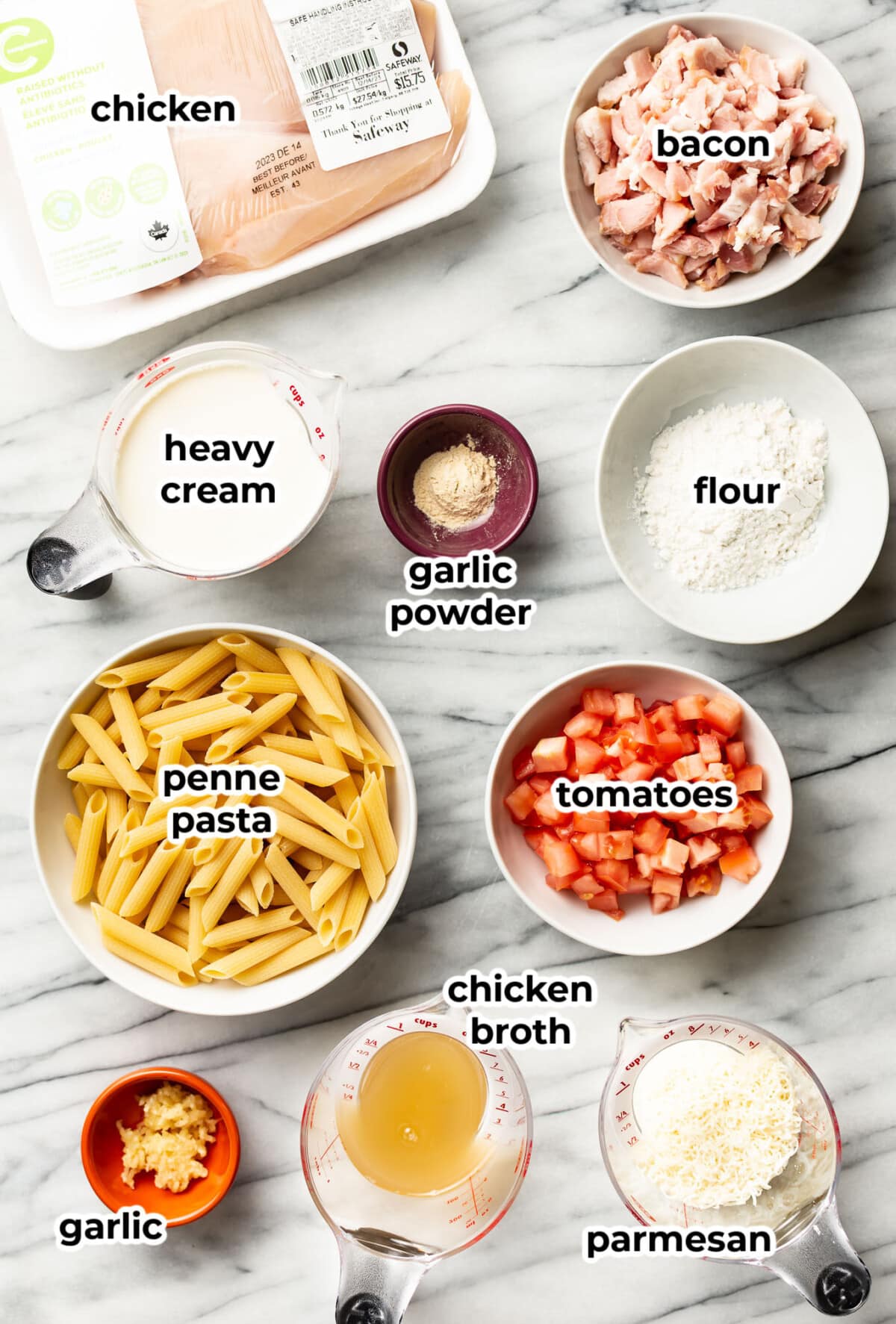 ingredients for chicken penne pasta in prep bowls
