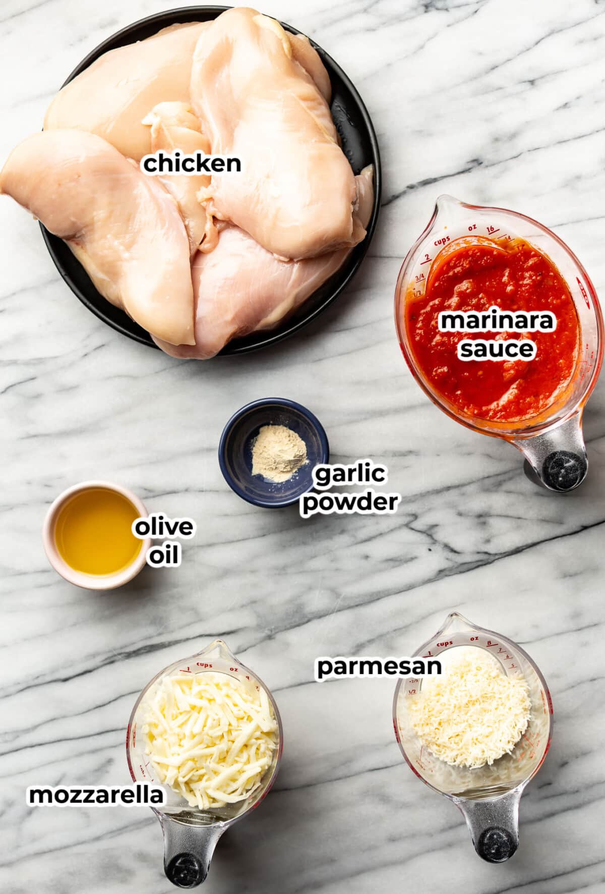 ingredients for cheesy chicken bake in prep bowls