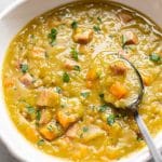 The BEST Instant Pot split pea soup (close-up in a white bowl)