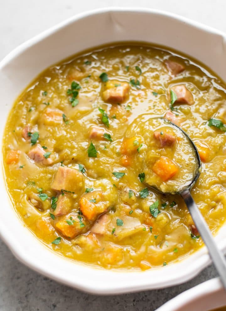 The BEST Instant Pot split pea soup (close-up in a white bowl)