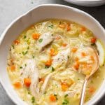 close-up of a bowl of Greek lemon chicken orzo soup