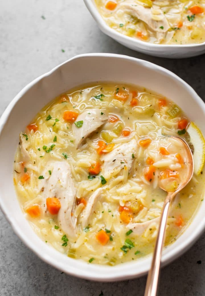 close-up of a bowl of Greek lemon chicken orzo soup