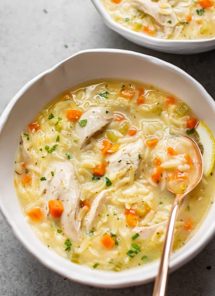 close-up of a bowl of Greek lemon chicken orzo soup