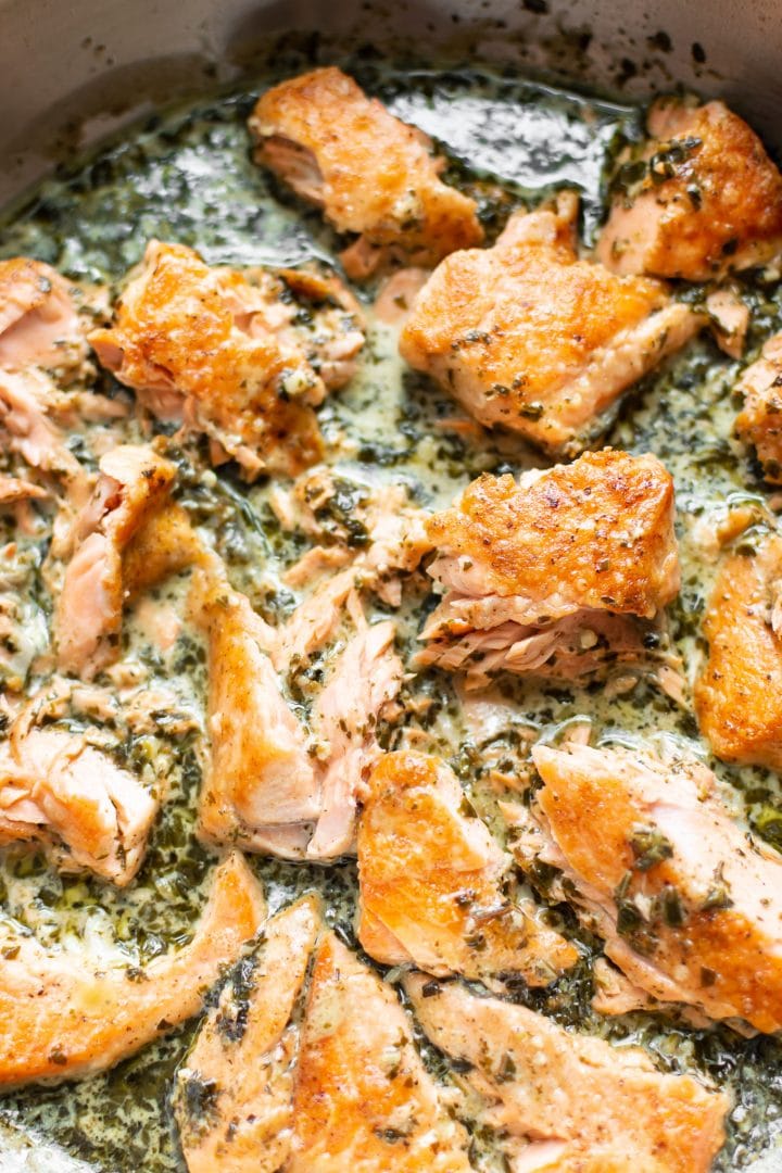 close-up of creamy salmon pesto pasta