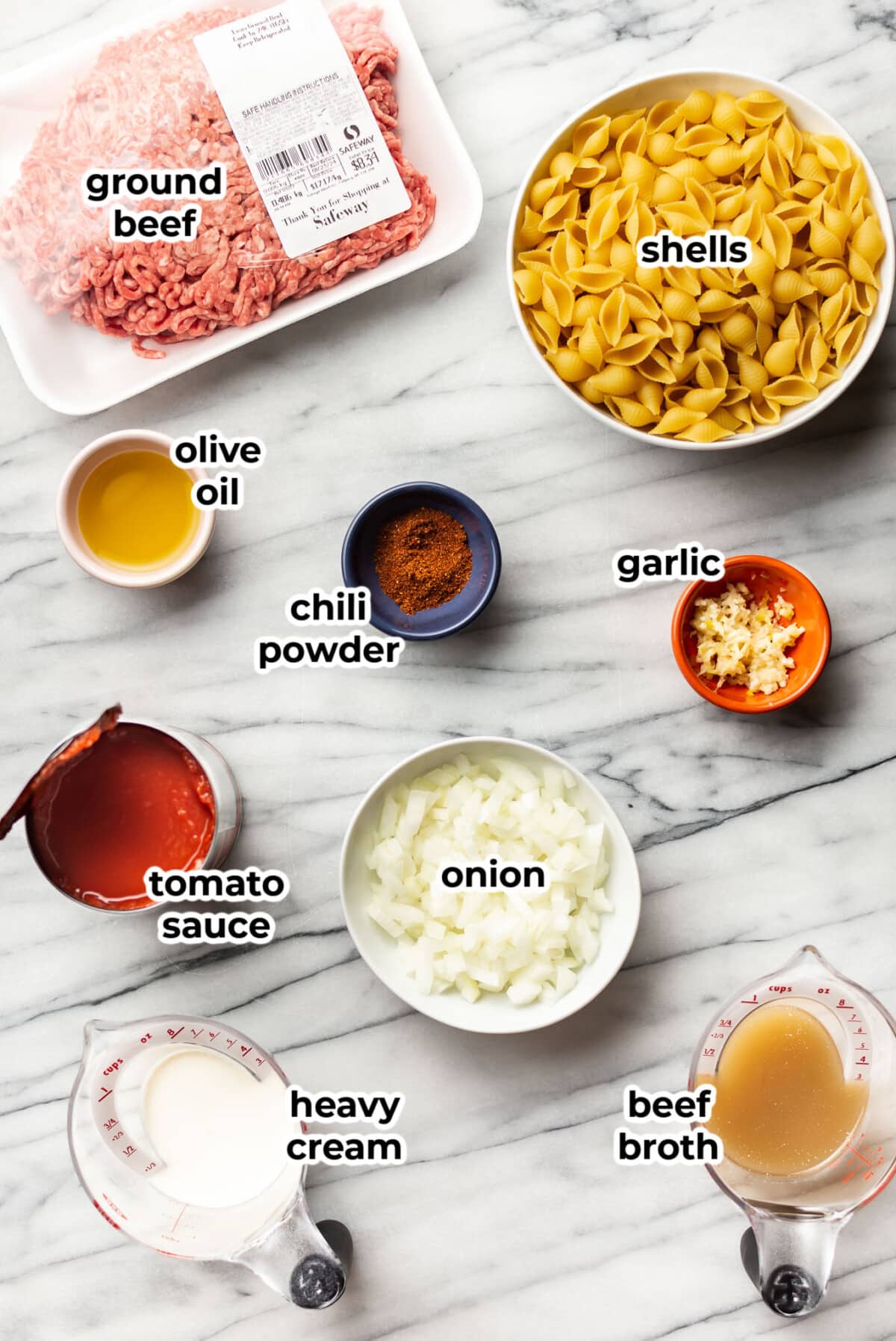 ingredients for creamy beef and shells in prep bowls
