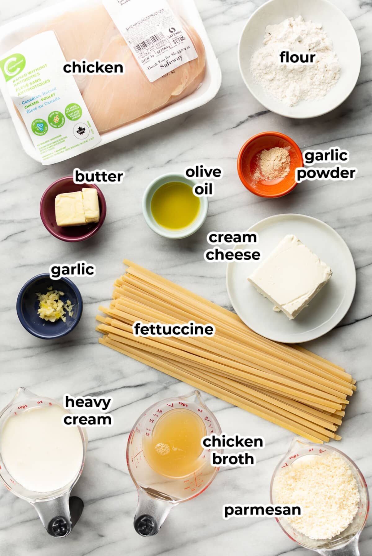 ingredients for chicken fettuccine alfredo in prep bowls