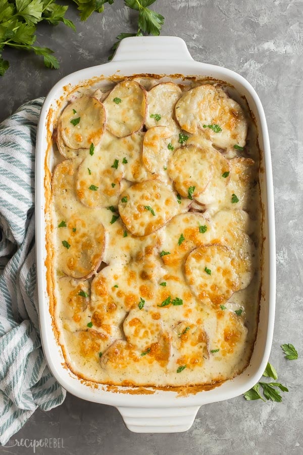 scalloped potatoes and ham in a baking dish