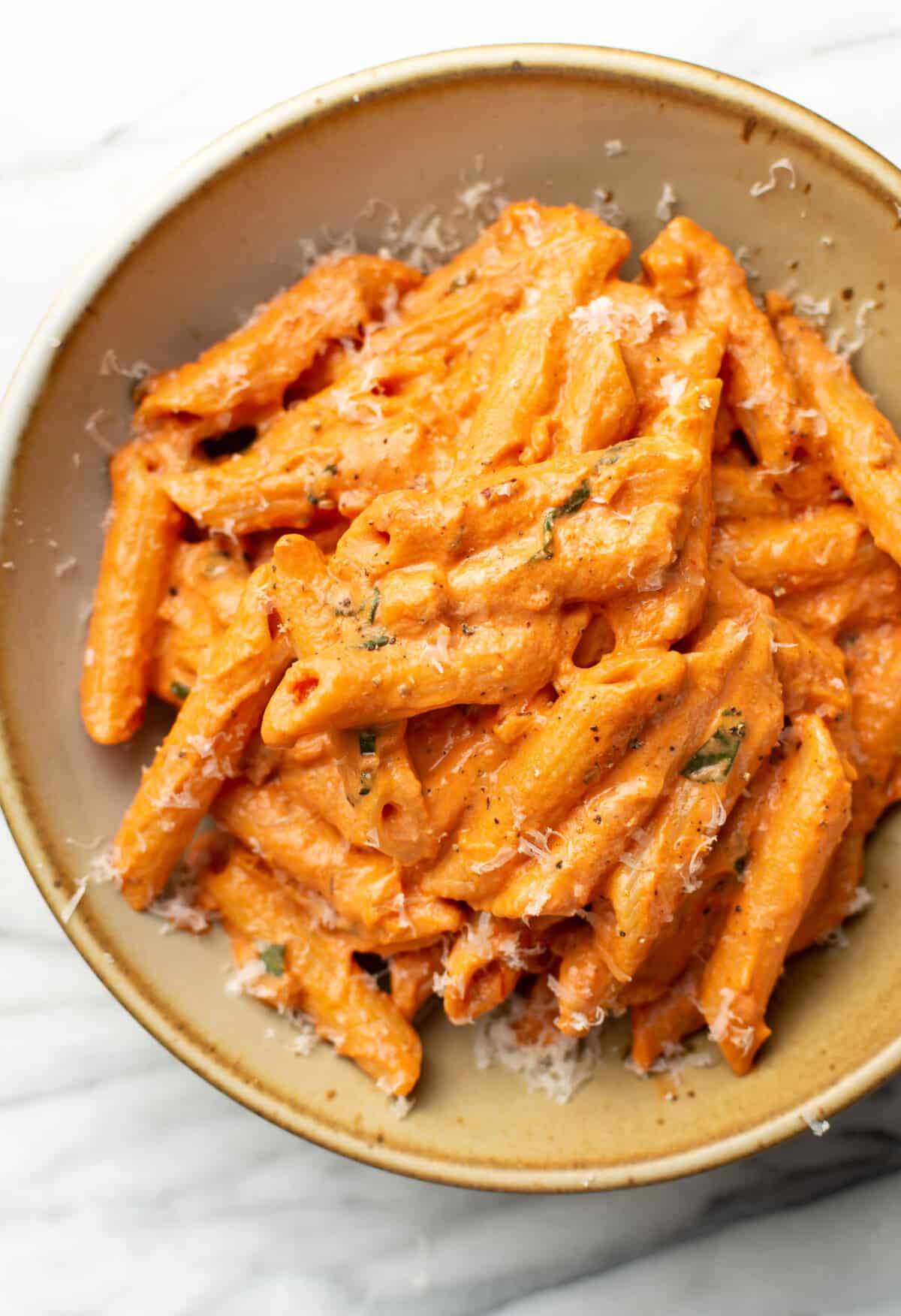 a bowl of tomato goat cheese pasta