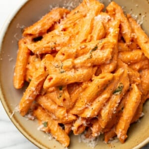 a bowl of tomato goat cheese pasta