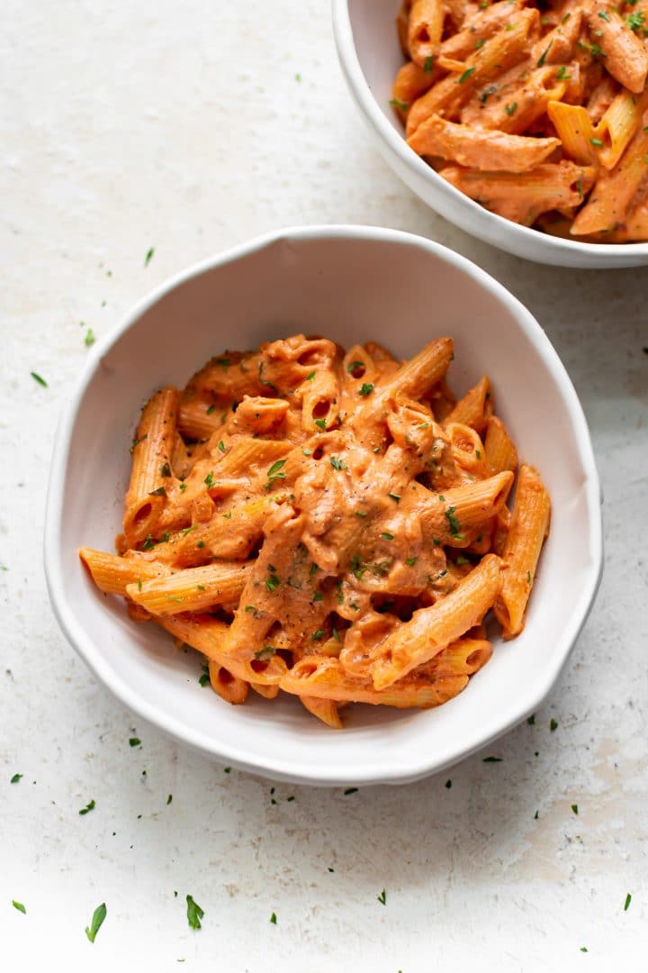 tomato goat cheese pasta in two bowls
