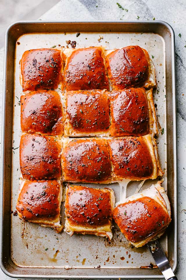 turkey, ham & cheese sliders on a tray