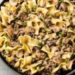 ground beef stroganoff with egg noodles in a skillet