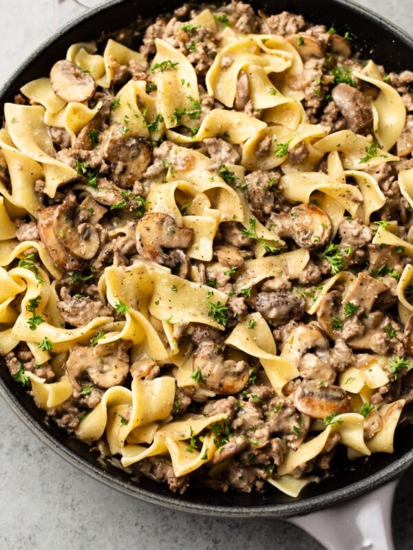 ground beef stroganoff with egg noodles in a skillet