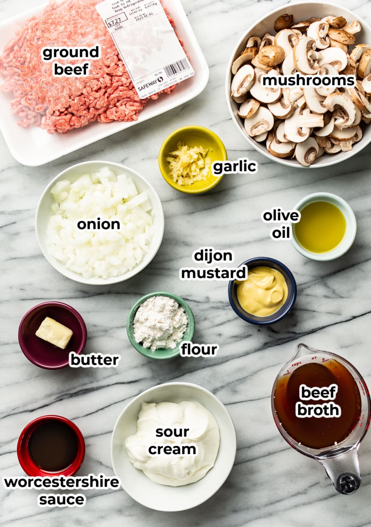 ingredients for ground beef stroganoff in prep bowls