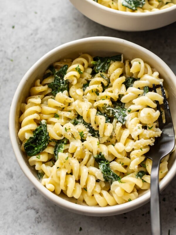 spinach goat cheese pasta in two bowls