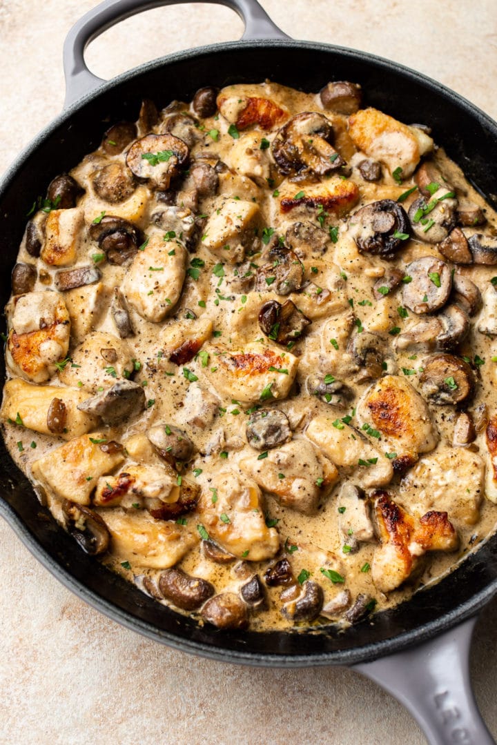 chicken stroganoff in a gray le creuset skillet