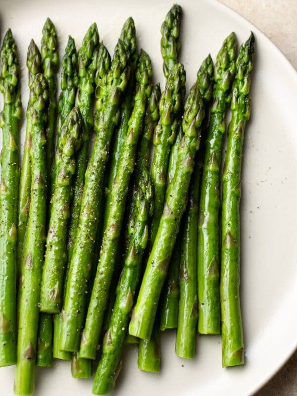 the best asparagus on a beige plate