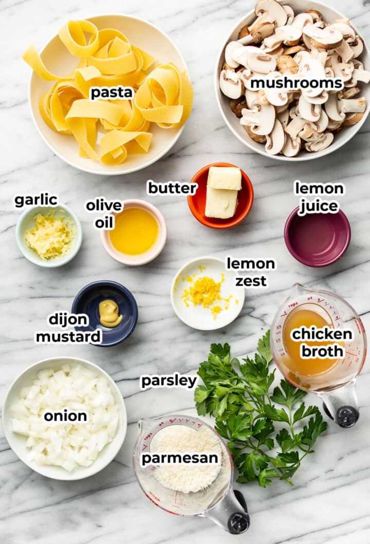 ingredients for garlic mushroom pasta in prep bowls