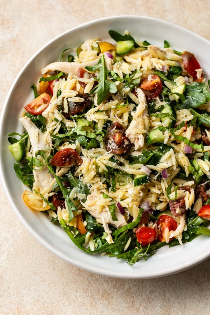 lemon orzo salad in a white bowl