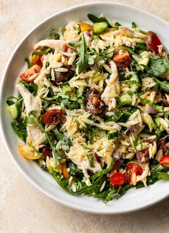 lemon orzo salad in a white bowl
