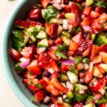 close-up of the best strawberry salsa in a turquoise bowl