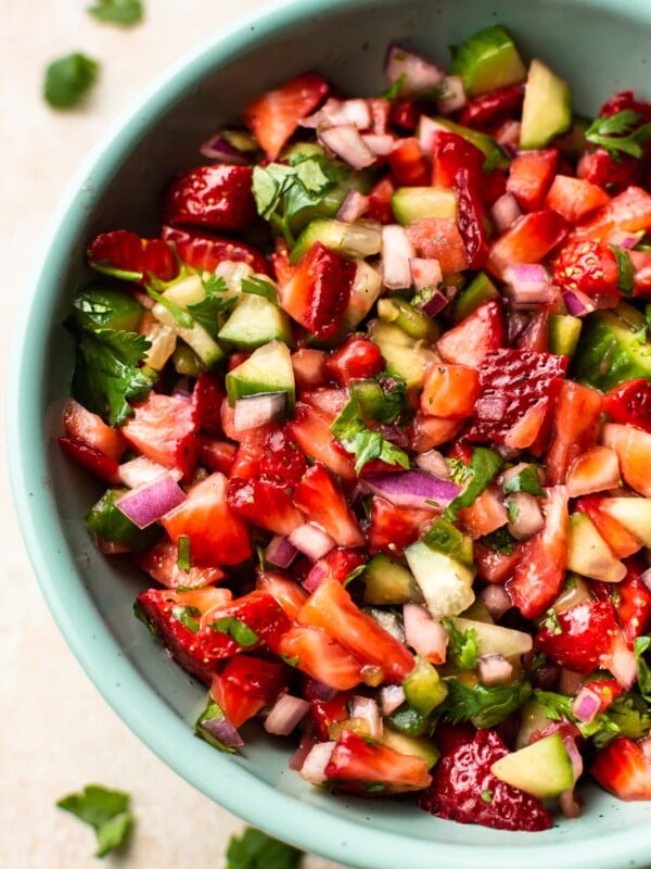 close-up of the best strawberry salsa in a turquoise bowl