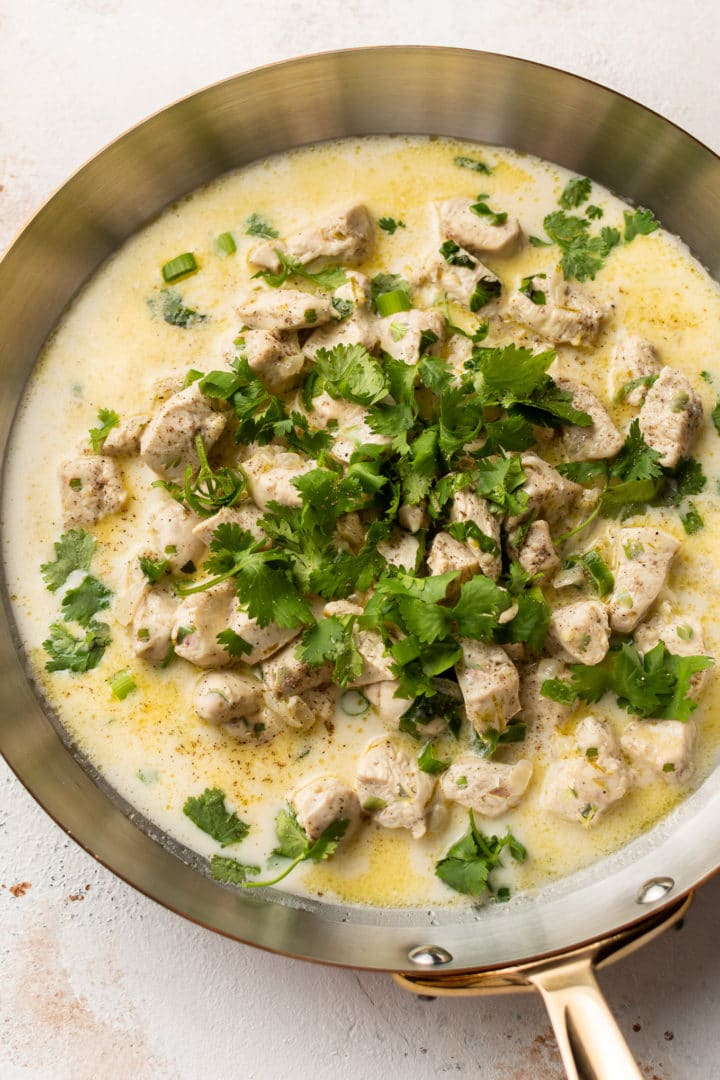 coconut lime chicken in a skillet