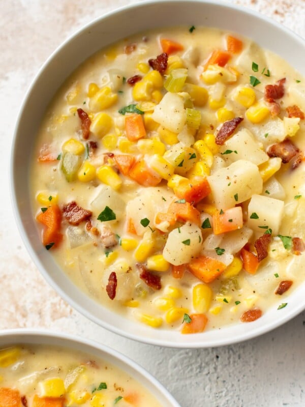 corn chowder in two white bowls