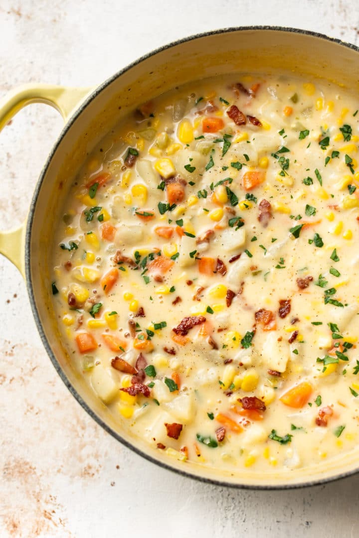 corn chowder close-up in a yellow pot