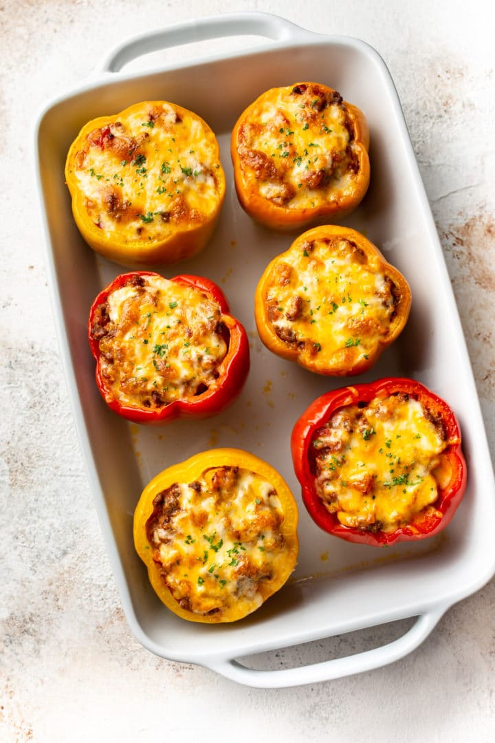 the best classic ground beef stuffed peppers in a white baking dish