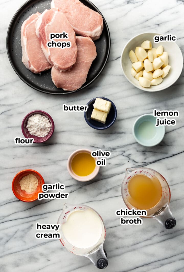 ingredients for creamy garlic pork chops in prep bowls