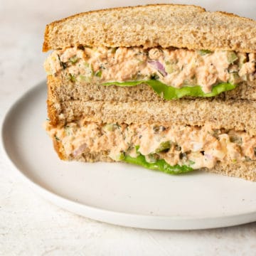 canned salmon salad sandwich (two halves stacked)