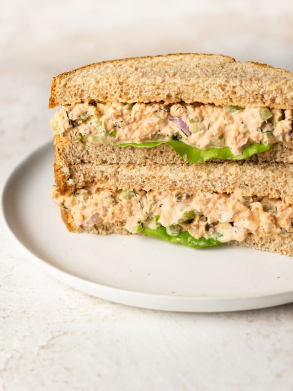 canned salmon salad sandwich (two halves stacked)