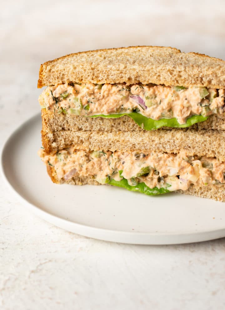 canned salmon salad sandwich (two halves stacked)