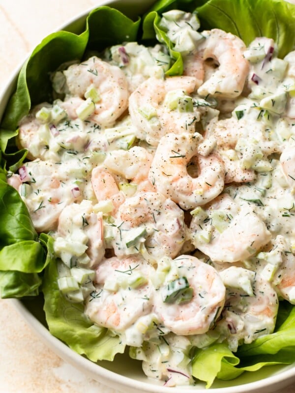 The best shrimp salad served over a bed of butter leaf lettuce (in a white salad bowl)