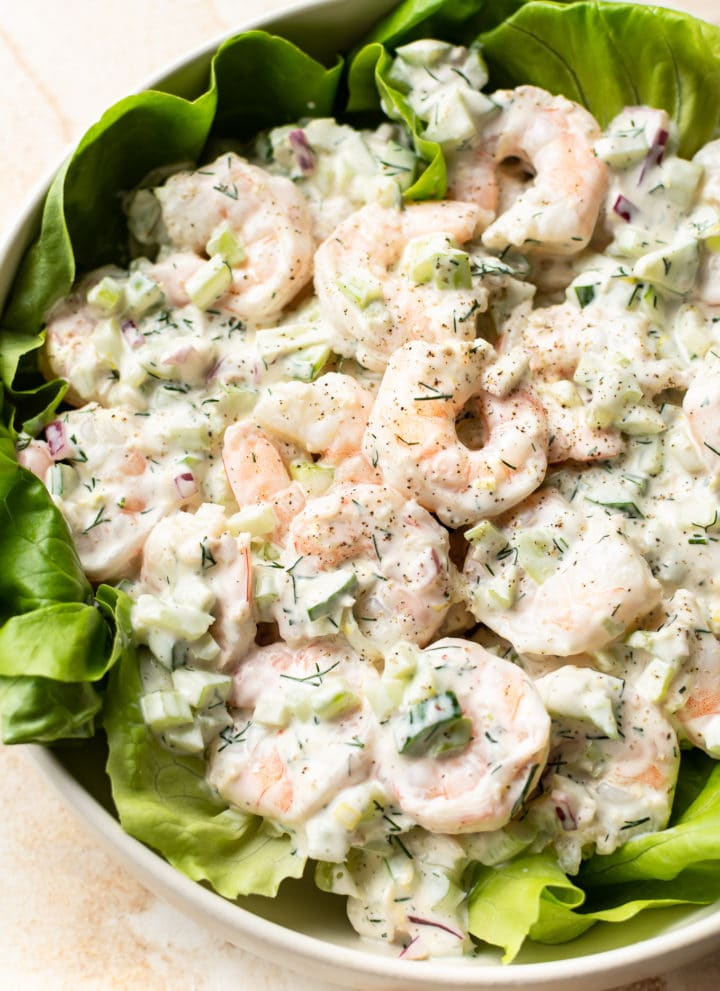 The best shrimp salad served over a bed of butter leaf lettuce (in a white salad bowl)