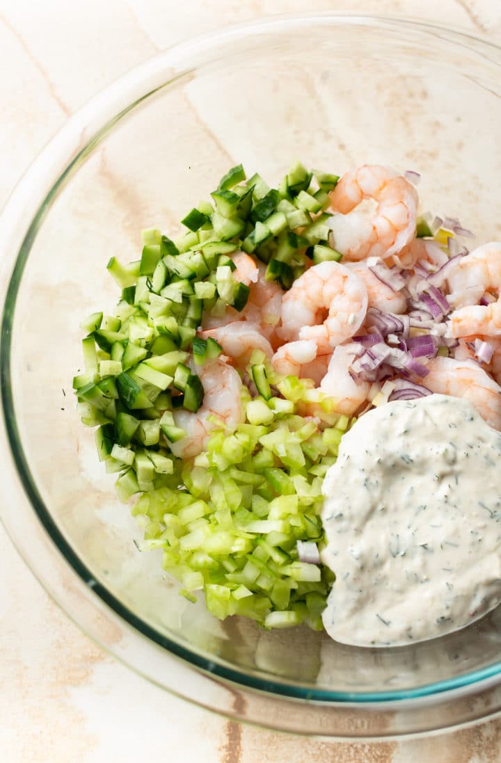 shrimp salad ingredients in a glass prep bowl