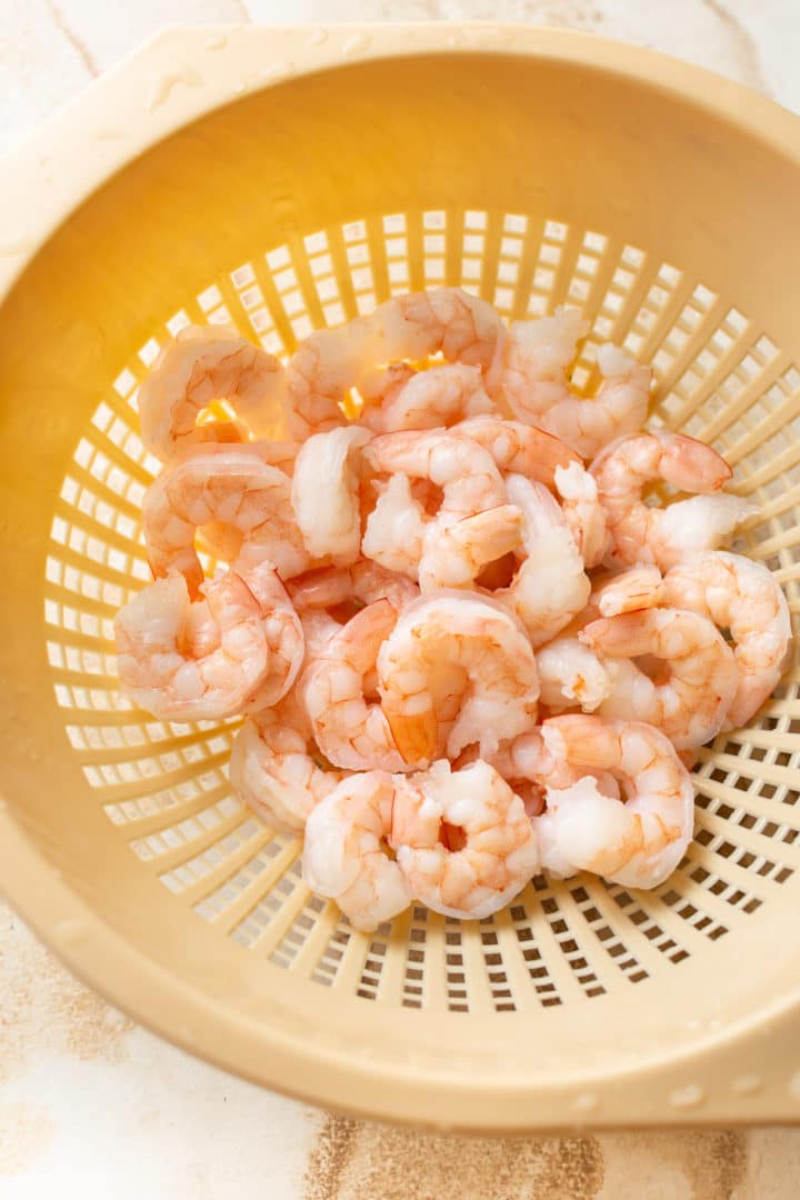 cooked shrimp in a colander