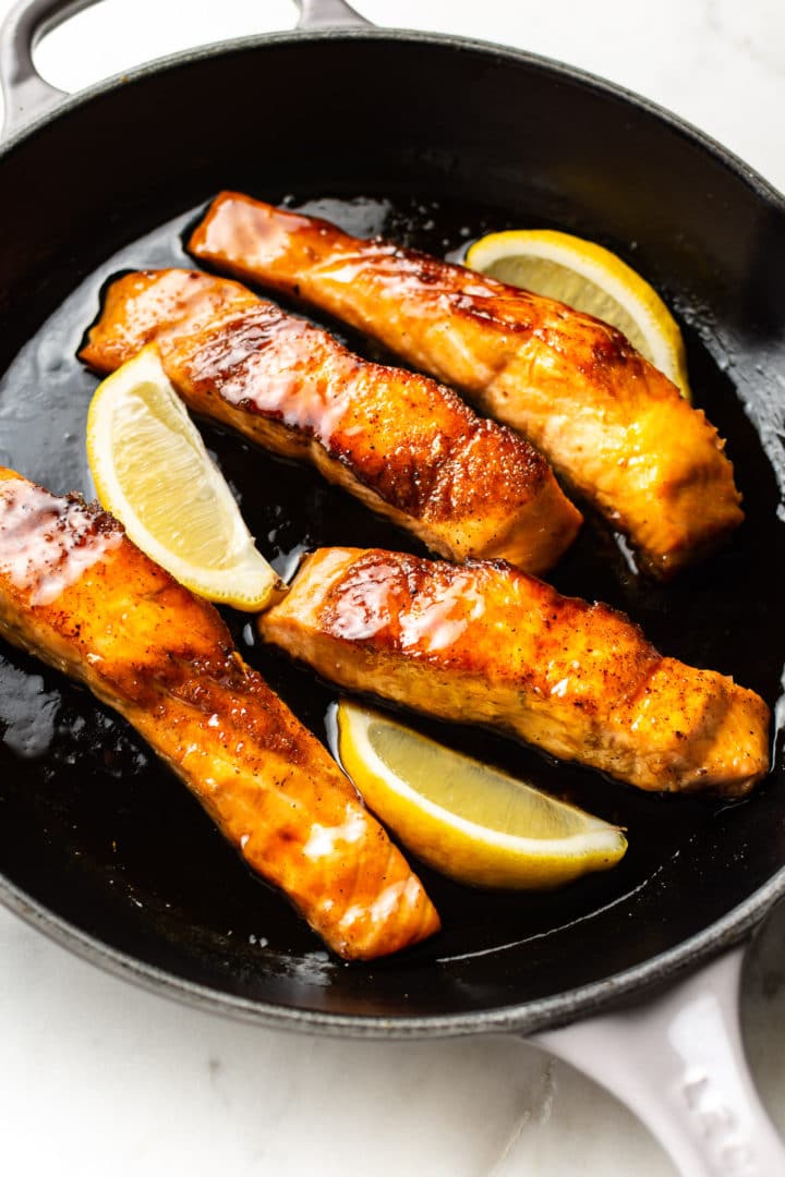 honey soy sauce glazed salmon in a skillet