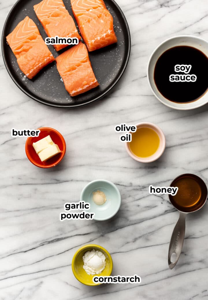 ingredients for honey glazed salmon in prep bowls