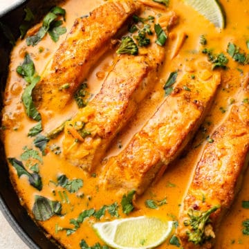 salmon coconut curry in a skillet