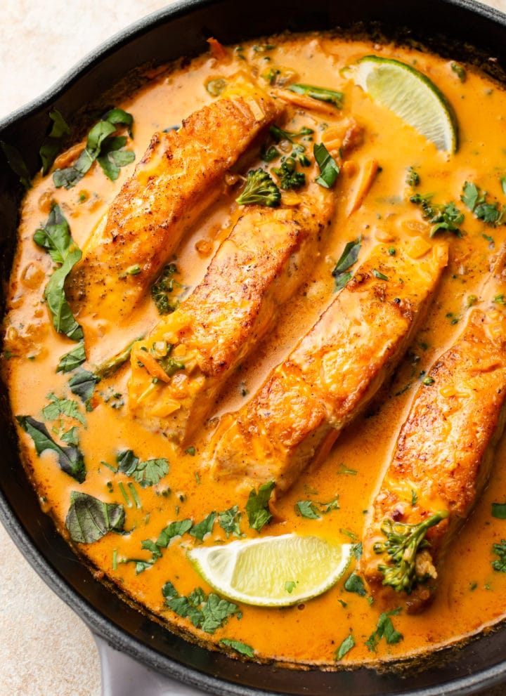 salmon coconut curry in a skillet