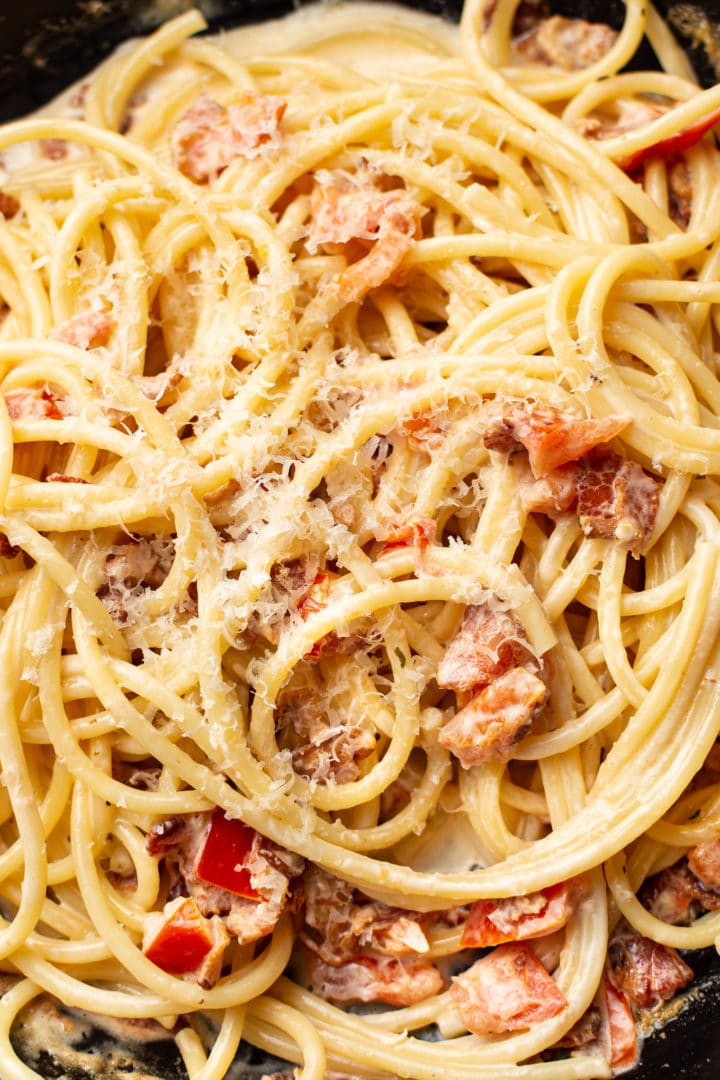 close-up of creamy tomato and bacon pasta