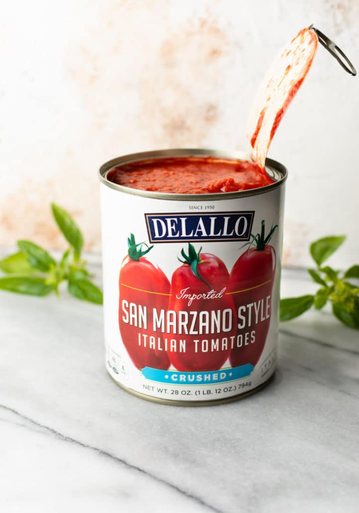 an open can of DeLallo's San Marzano Style Crushed Tomatoes (28 ounce can)